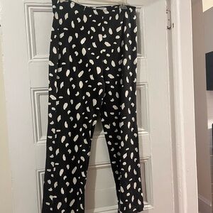 Reformation Black pants with animal print and back zipper